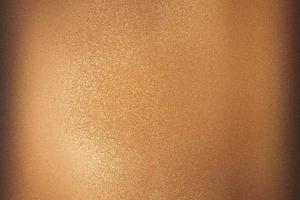 Texture of bronze brushed metallic plate, abstract background photo