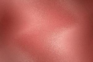 Texture of red brushed metallic plate, abstract background photo