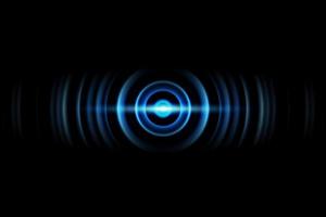 Abstract light blue ring with sound waves oscillating background photo