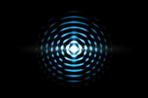 Abstract light blue ball effect with sound waves oscillating on black background photo