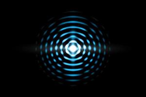 Abstract light blue ball effect with sound waves oscillating on black background photo