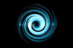 Glowing spiral tunnel with light blue cloud on black sky background photo