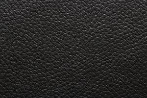 Rough black leather sheet, abstract pattern texture background photo