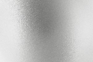 Texture of reflection on rough gray silver sheet, abstract background photo