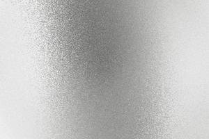 Texture of reflection on rough gray silver sheet, abstract background photo