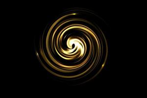 círculo dorado abstracto con espiral de luz sobre fondo negro foto