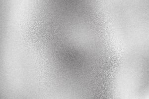 Fondo de textura abstracta, pared de metal de onda de hoja de plata brillante foto