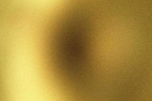 Glowing rough golden steel wall surface, abstract texture background photo