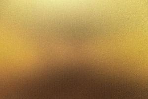 Polished golden steel plate, abstract texture background photo