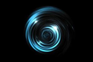 Glowing light blue vortex on black backdrop, abstract background photo