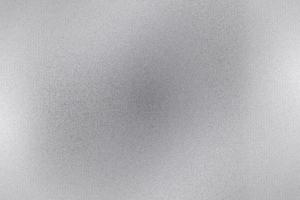 Brushed silver metal sheet surface, abstract texture background photo