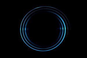 Light blue spiral with circle ring on black backdrop, abstract background photo