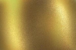 Shiny dark yellow metal wall, abstract texture background photo