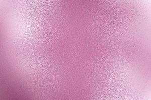 Reflection on rough pink sheet surfaces, abstract background photo