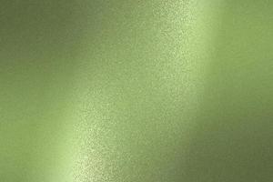 Reflection on rough light green metallic sheet surfaces, abstract texture background photo