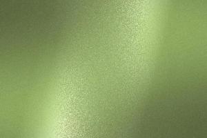 Reflection on rough light green metallic sheet surfaces, abstract texture background photo