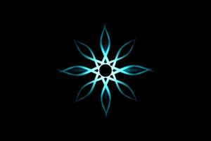 Abstract teal flower with light effect on black background photo