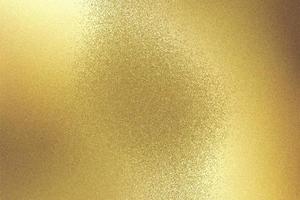 Glowing gold steel wall texture, abstract background photo