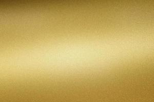 Glowing gold steel tube surface, abstract texture background photo