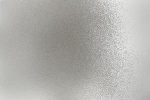 Texture of silver brushed metallic plate, abstract background photo