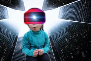 Defocus overlapping image of a baby girl wearing virtual reality glasses and a modern building. Metaverse digital cyber technology concept. Future digital technology cyber virtual game entertainment. photo