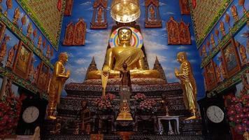 Temple thailand gold buddha wat bua khwan in nontraburi photo