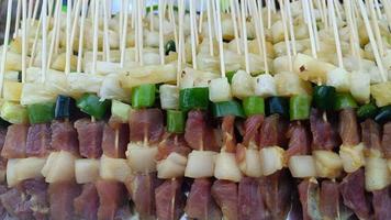 Pork skewers bbq for grilling Thai street food delicious photo