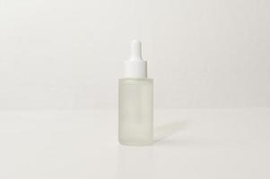 moisturizing cream bottle over white background studio, packing and skincare beauty concept photo