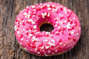 donut pink sweet dessert icing glaze fresh meal food diet snack photo
