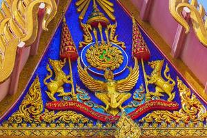 Colorful Wat Don Mueang Phra Arramluang buddhist temple Bangkok Thailand. photo