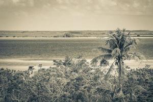 Muyil Lagoon panorama view in tropical jungle of amazing Mexico. photo