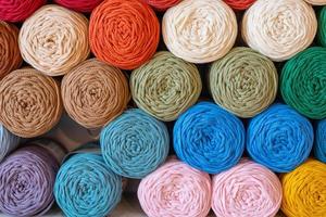 Balls of wool in various colors. close up view on wool knitting balls in different colors. photo