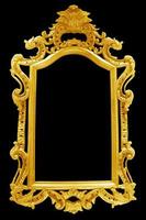 antique golden frame isolated on black background photo