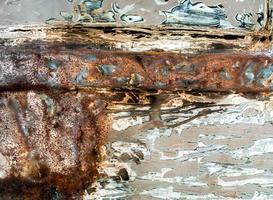 Rusted on surface of old metal plate photo