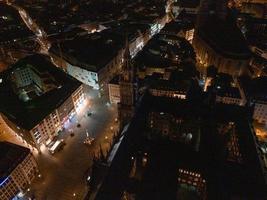 Aerial wide panorama of New Town Hall and Marienplatz at night Munich city