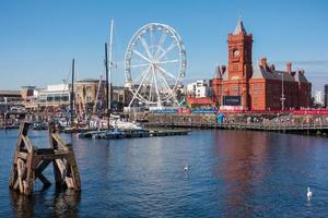 CARDIFF, UK, 2019. Ferris Wheel and Pierhead Building photo