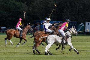 MIDHURST, WEST SUSSEX, UK, 2020. People playing polo photo