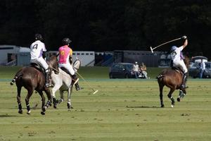MIDHURST, WEST SUSSEX, UK, 2020. People playing polo photo