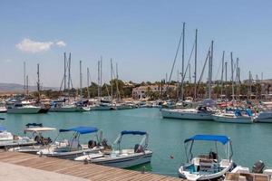 LATCHI, CYPRUS, GREECE, 2009. Assortment of boats in the marina photo