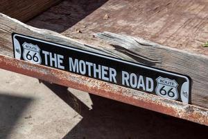 SELIGMAN, ARIZONA, USA, 2011. Old sign on a flat bed trailer photo