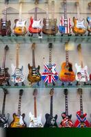 FLORENCE, TUSCANY, ITALY, 2019. Miniature guitars in a shop window photo