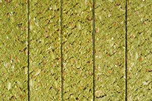 Crispy chips with kelp and spirulina as background texture photo