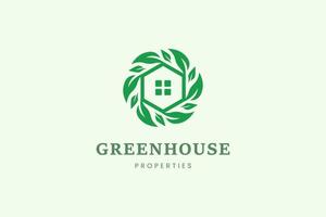 plantilla de logotipo de hogar y árbol de hoja para propiedad o negocio inmobiliario vector