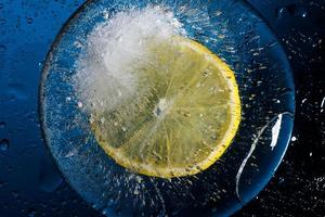 Freshness orange and cristal cube of ice photo