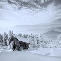 beautiful wooden house in a winter photo