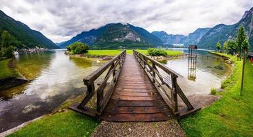 wooden bridge over the river photo