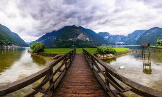 wooden bridge over the river photo