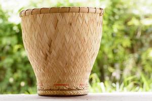 Earthenware steamer is the bamboo container for cook glutinous rice photo