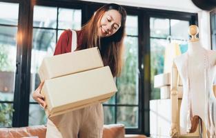 Small business shop owner carry boxes preparing to delivery photo