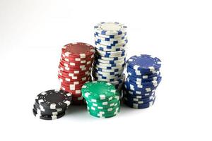 Stack of poker chips. Colorful tokens. Card game and gambling. Casino and gaming. photo